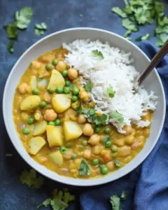 Slow Cooker Red Lentil Chickpea Curry with Potatoes Peas